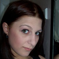 Jenna Mayne Young woman with brown hair and big hazel eyes